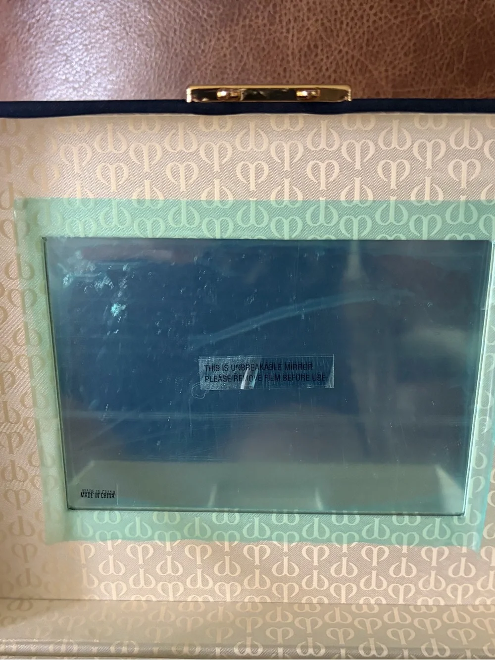 NWOT Cle’ de Peau elegant blue satin small/travel jewelry box. Mirror. Drawer